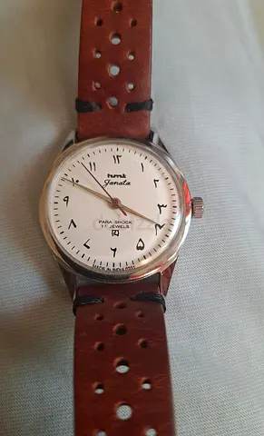 Vintage Jamal / Janata mechanical wristwatch with Arabic numerals, leather strap