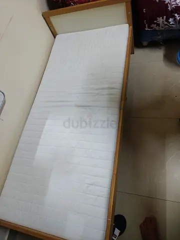 Ikea Single wooden bed frame with Ikea mattress - washable cover
