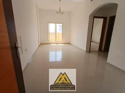 For annual rent in Al Rawda, Ajman: 1BR, 1 bath, balcony, central AC, AED 30K, 4 payments.