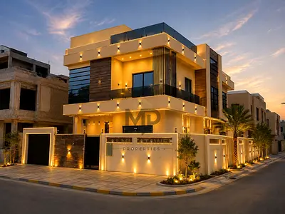 Luxury corner villa for sale in Ajman | Two floors + roof | Prime strategic location | Price includes registration and ownership fees | Freehold owner
