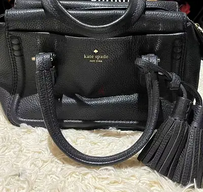 Kate Spade black leather tote bag with tassel - good condition