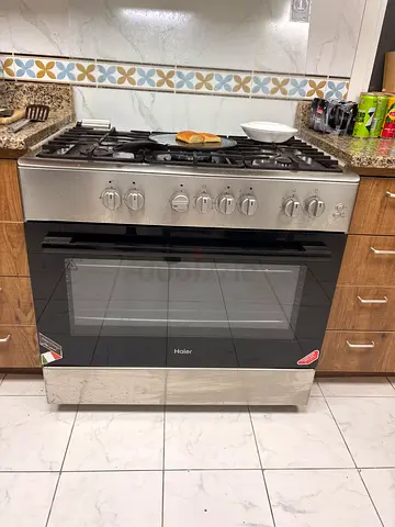 Haier Stainless Steel Gas Range with Oven - Good Working Condition