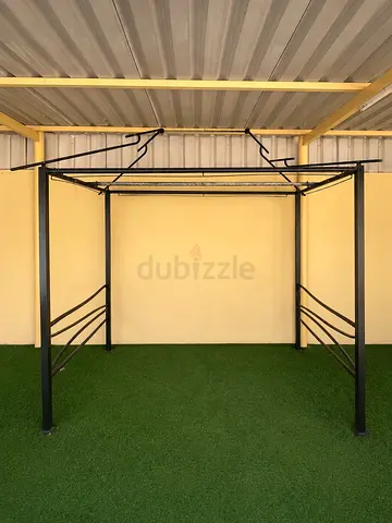 Small metal frame pergola with a retractable canopy