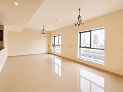 2 Bedroom Apartment | Remal Tower JVC | Balcony & Downtown View