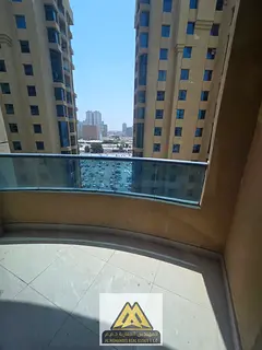 Investment opportunity: One bedroom and living room with balcony, prime location in Al Khor Towers, 