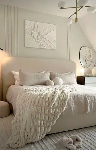 Queen upholstered bed with padded headboard
