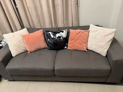 3-seater grey fabric sofa with cushions