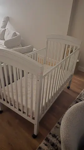 White Wooden Baby Crib in Good Condition from juniors with mattress