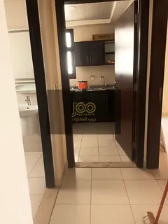 The apartment is located in the Al Maqta area and is a suitable choice for families seeking reasona