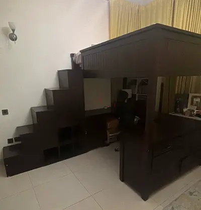 Solid dark wood loft bed with integrated desk and storage (single/twin)
