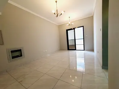 Like brand new very spacious 1bhk with balcony Prime location close to emirates road