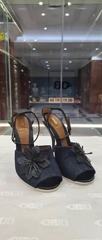 Worn-once navy peep-toe wedge heels with bow detail, size available