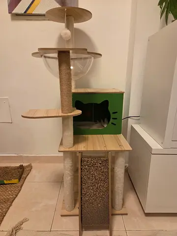 Wooden multi-level cat tree with hideout and scratching posts