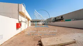 Industrial Yard 10,000 Sq. Ft. in Al Sajaa | AED 200K/Year | Main Road | 2,500 Sq. Ft. Steel Shed