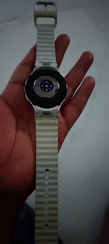 Used white fitness smartwatch with heart-rate sensor — good condition