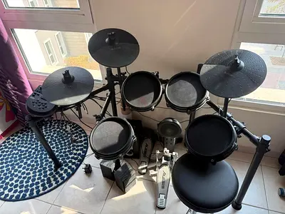 Alesis Nitro DM7X Electronic Drum Kit (Compact Set with Pedals and adjustable Throne) and sticks