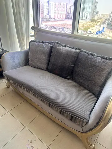 Gray expensive looking 3 seater