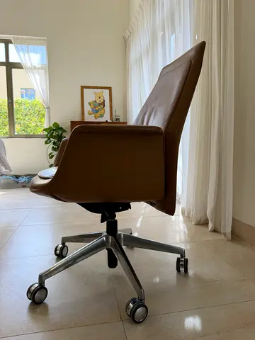 Frau Brown leather swivel office chair on casters - original price 7000AED now only 2500AED!