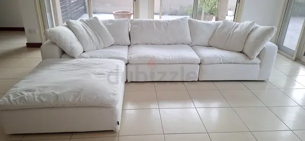 Marina Homes cloud-style L-shaped sofa set. It's white,