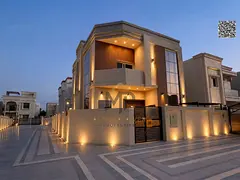 Luxury villa for sale in Al Yasmin with a modern design and high-end finishes, including air conditi