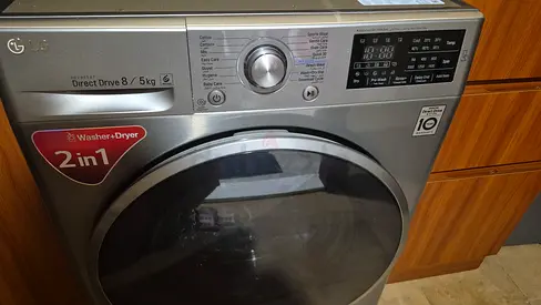 LG 2-in-1 Front Load Washer Dryer 8kg/5kg - Silver, Used.