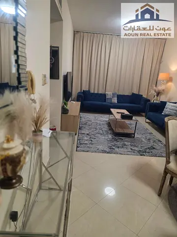 Furnished one-bedroom apartment with a living room in Al-Taawun.
