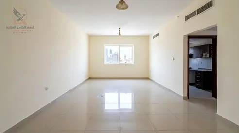 Two-bedroom apartment for annual rent in Al Rashidiya 2 near Ladies Park Two bathrooms balcony open view ready to move in