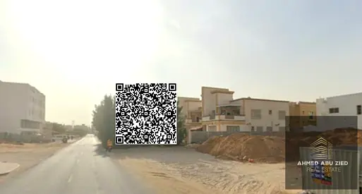Residential and commercial plot (G+1) for sale in Al-Mowihiat 3, on a paved street, freehold