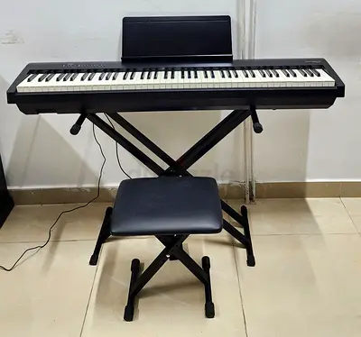 The Roland FP-30X BK is an 88-key portable digital piano in black featuring Roland's SuperNATURAL