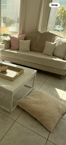 Light beige 3-seater sofa with scalloped back — good condition