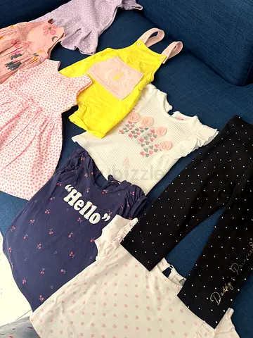 Bundle of baby girl clothes - dresses, rompers and tops (used)