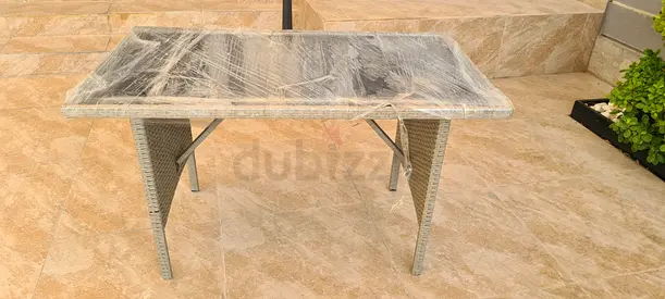 NEW outdoor rattan glass top patio table - Unused