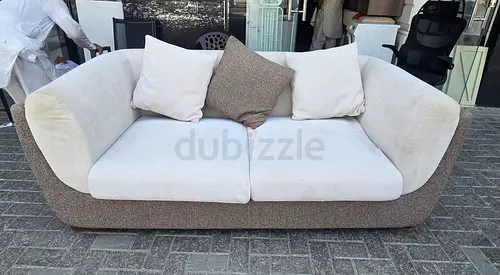 Comfortable 2-Seater Sofa in Beige and Brown with Cushions