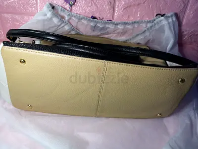 Calvin Klien Beige and black leather tote bag with shoulder straps