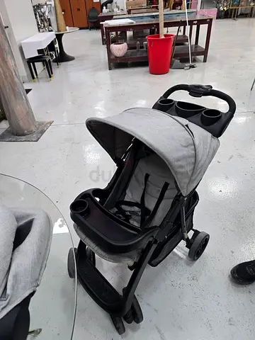 Lightweight Gray Standard Stroller with Canopy and Cup Holders