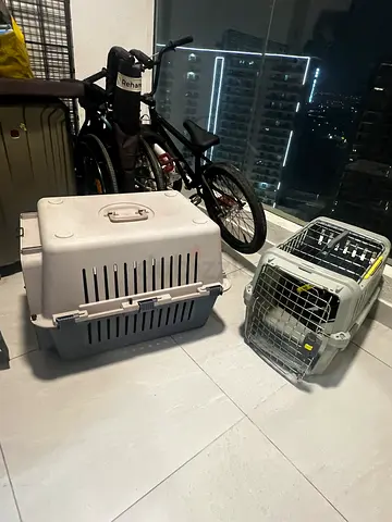 Two pet carriers (large and medium) - sturdy plastic crates