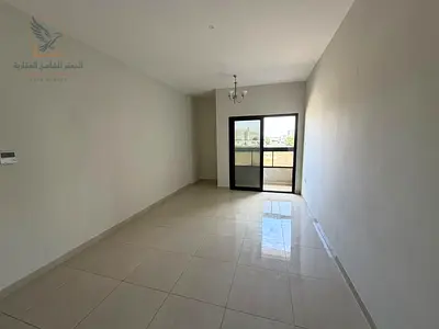 Two bedrooms and a living room with a balcony and private parking, central air conditioning, open view