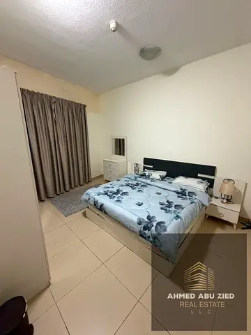 For 5-Month Rent in Al Yasmeen Towers | 2 Bedrooms & Living Room | Tower Parking | AED 20,000 Cash | All Bills & Internet Included