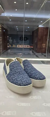 Blue patterned slip-on casual shoes, size unknown, gently used