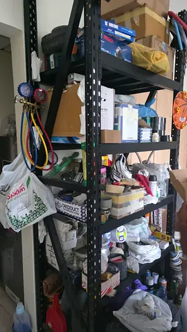 Metal slotted angle storage shelves