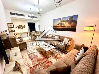 Muwailih Commercial: Two bedrooms, a living room, three bathrooms, and a balcony. Both bedrooms are