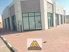 New shops with prime spaces suitable for all activities in the Al Zahia area on a main street near a