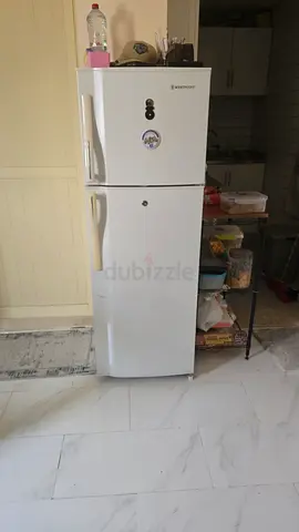 White double-door refrigerator with top freezer - used, good condition