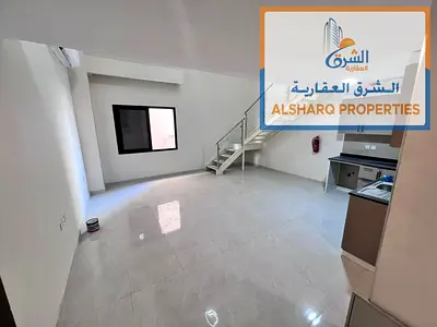 **Duplex studio with 2 bathrooms, split AC, easy access to Sharjah & Dubai, and convenient access to Sheikh Mohammed Bin Zayed Road.**
