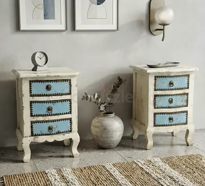 Pair of vintage-style wooden bedside tables / nightstands - distressed white with blue drawers