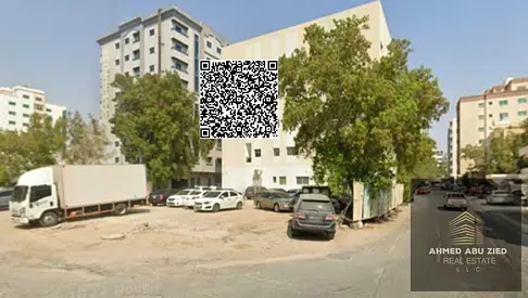Residential and commercial plot (G+6) for sale in Al Rashidiyah 3, Ajman, near the Civil Defence Centre