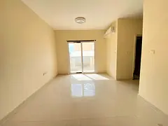 BRAND NEW 1 BHK WITH BALCONY ON ROAD BUILDING MUWALIEH