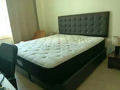 King-size bed frame with mattress and upholstered headboard - good condition
