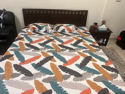 King bed with bedside table