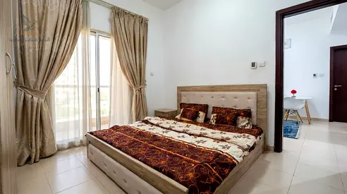 Furnished Apartment for Monthly Rent in City Towers Ajman One bedroom living room two bathrooms balcony open view ready for immediate occupancy